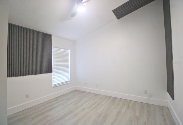 unfurnished room featuring light hardwood / wood-style floors and ceiling fan