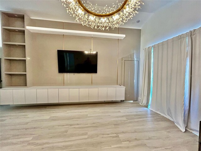 unfurnished living room featuring light wood finished floors