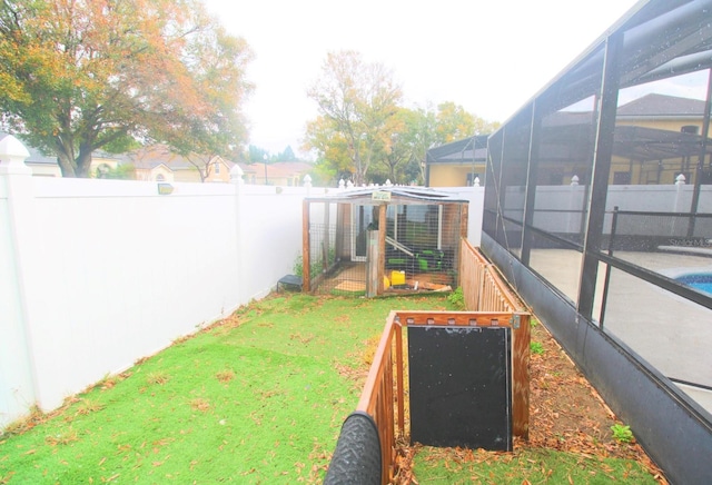 view of yard with a fenced backyard