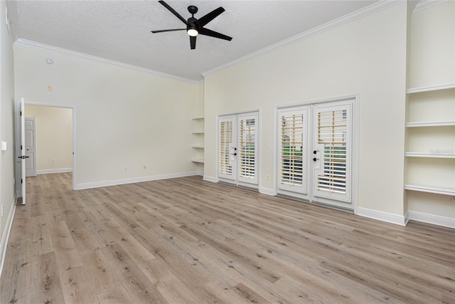 unfurnished bedroom featuring a textured ceiling, french doors, ornamental molding, ceiling fan, and light hardwood / wood-style flooring