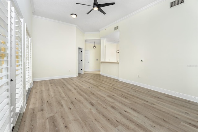 unfurnished living room with light wood-type flooring, ceiling fan, and crown molding