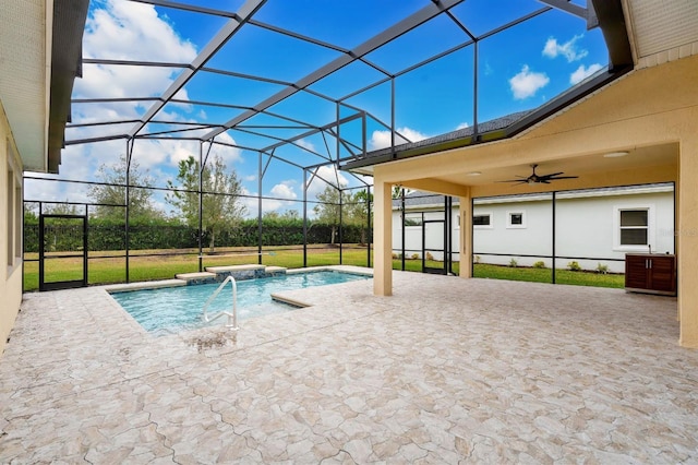 view of swimming pool with ceiling fan, a patio area, a lanai, and pool water feature