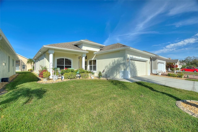 view of front facade featuring a garage and a front lawn