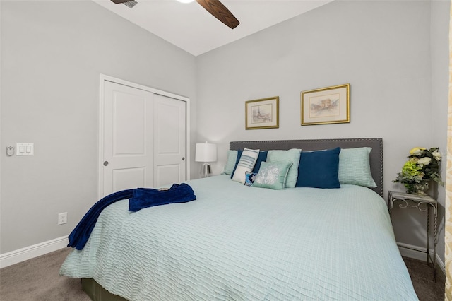 bedroom with a closet, ceiling fan, and carpet