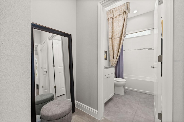 bathroom with toilet, tile patterned floors, and shower / bathtub combination with curtain