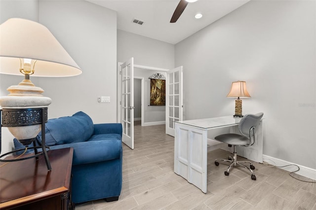 office space featuring french doors and ceiling fan