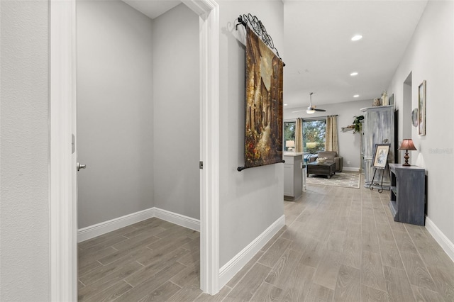 corridor featuring light hardwood / wood-style flooring