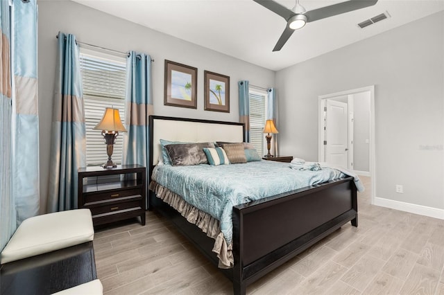 bedroom featuring ceiling fan and light hardwood / wood-style floors