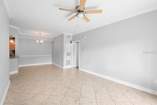 tiled empty room featuring ceiling fan with notable chandelier and ornamental molding