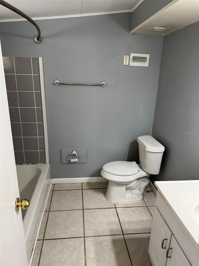 full bathroom featuring shower / washtub combination, toilet, vanity, baseboards, and tile patterned floors