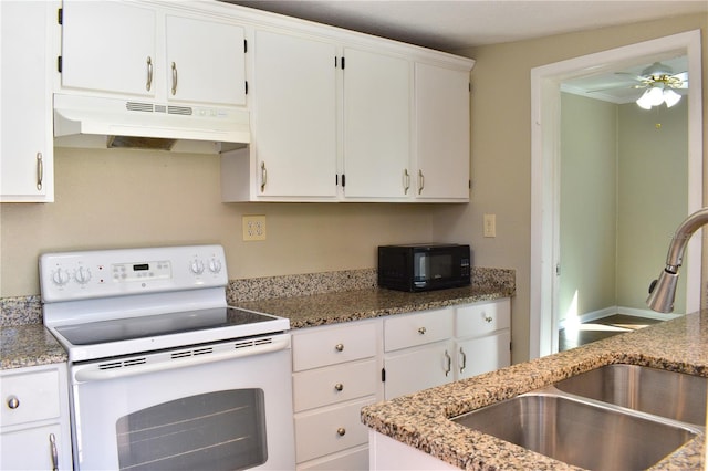 kitchen featuring white range with electric stovetop, white cabinetry, a sink, black microwave, and under cabinet range hood