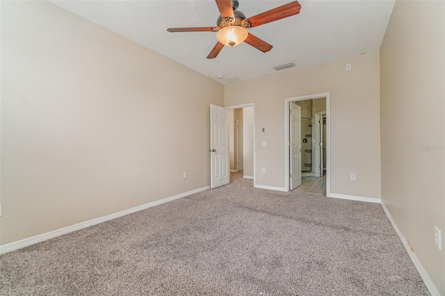 unfurnished bedroom featuring light colored carpet and ceiling fan