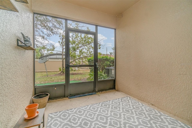 sunroom with a healthy amount of sunlight