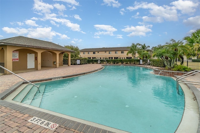 view of swimming pool featuring a patio