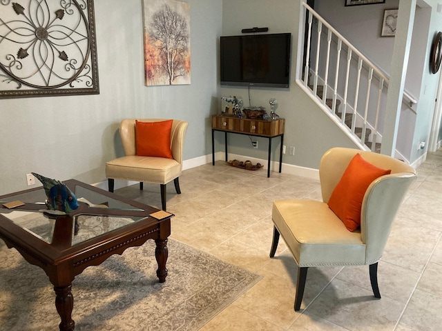 sitting room with tile patterned floors