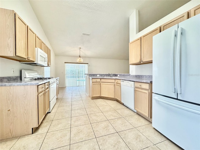 kitchen featuring light brown cabinetry, decorative light fixtures, light tile patterned floors, white appliances, and lofted ceiling