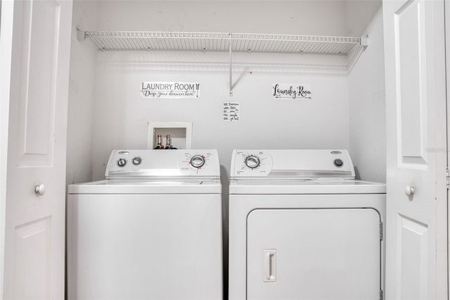 laundry area featuring washing machine and dryer