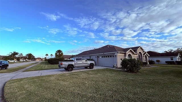 view of property exterior with a yard and a garage