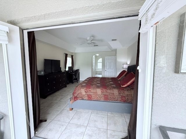 bedroom featuring ceiling fan and light tile patterned flooring