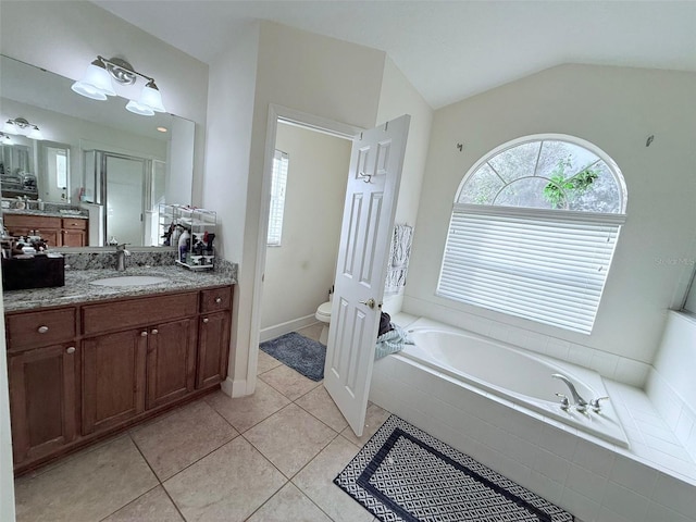 full bathroom featuring tile patterned floors, toilet, vanity, plus walk in shower, and lofted ceiling