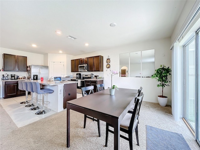 view of carpeted dining room