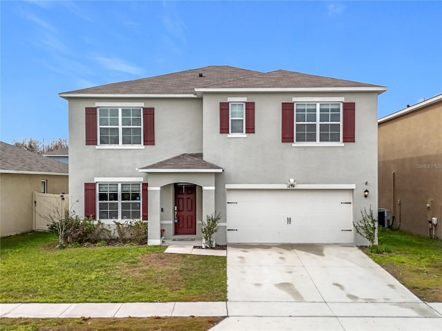 1634 Reddish Egret Ct, Davenport, FL 33897 - traditional-style home featuring a shingled roof, stucco siding, an attached garage, and a front lawn