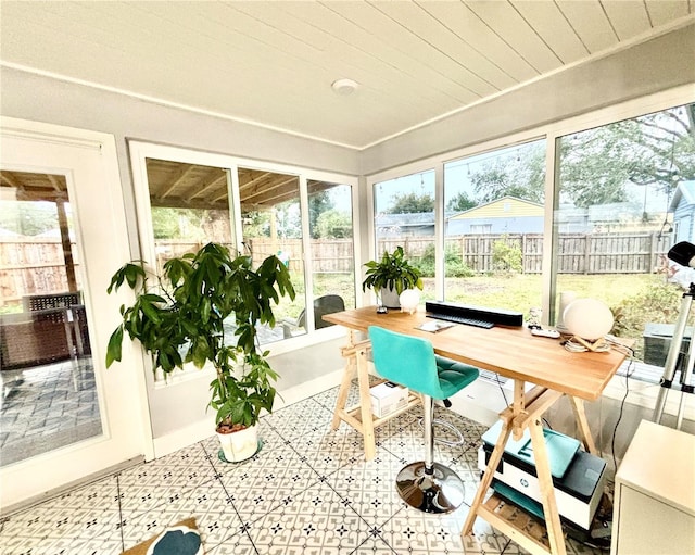 sunroom / solarium with wood ceiling and plenty of natural light