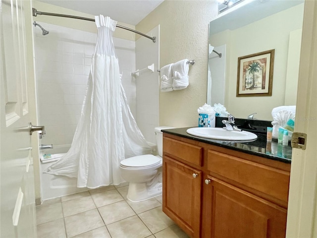 full bathroom with vanity, tile patterned flooring, toilet, and shower / bath combo