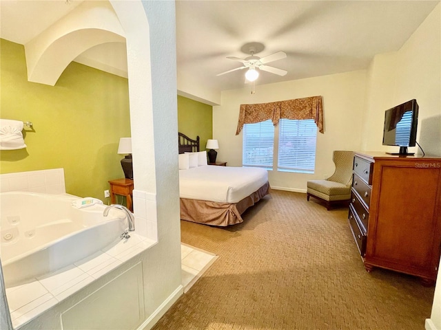 bedroom featuring ceiling fan and light colored carpet