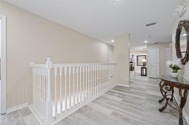 hallway featuring light wood-type flooring