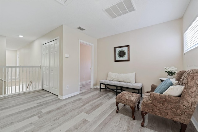 living area featuring light wood-type flooring