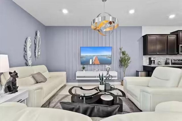 living room featuring an inviting chandelier