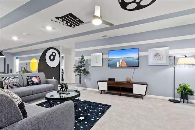 living room featuring ceiling fan and carpet floors