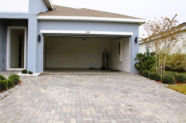 1280 Tupelo Trl, Haines City, FL 33844 - garage featuring water heater