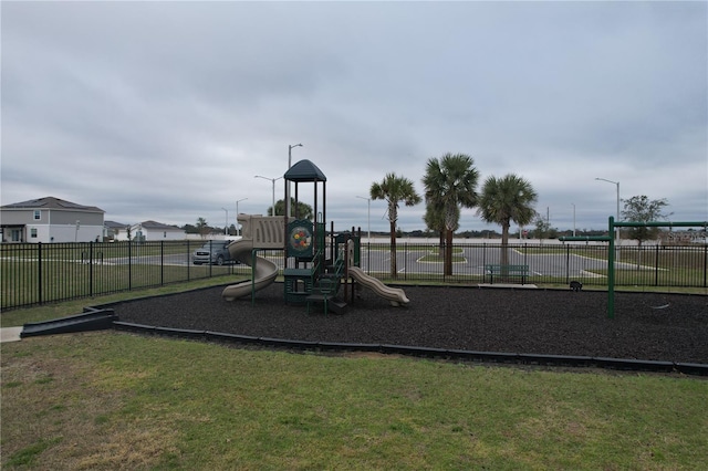 1280 Tupelo Trl, Haines City, FL 33844 - view of jungle gym with a lawn