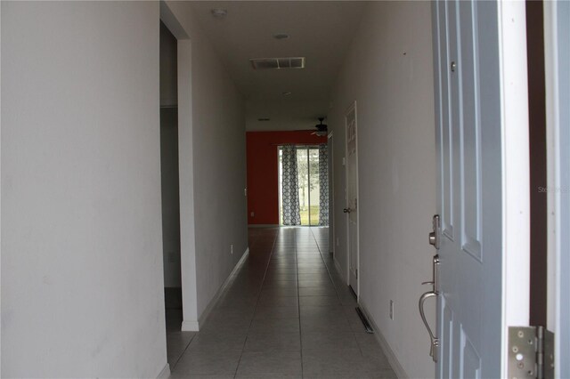1280 Tupelo Trl, Haines City, FL 33844 - corridor featuring light tile patterned flooring