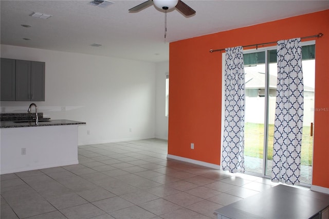 1280 Tupelo Trl, Haines City, FL 33844 - interior space with ceiling fan, sink, and light tile patterned floors