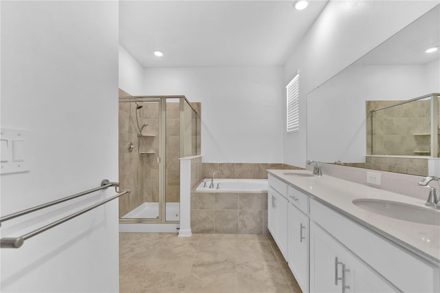 bathroom featuring a stall shower, a sink, and a bath