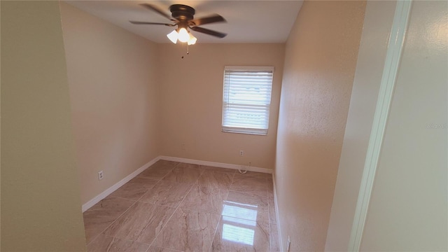 unfurnished room featuring ceiling fan