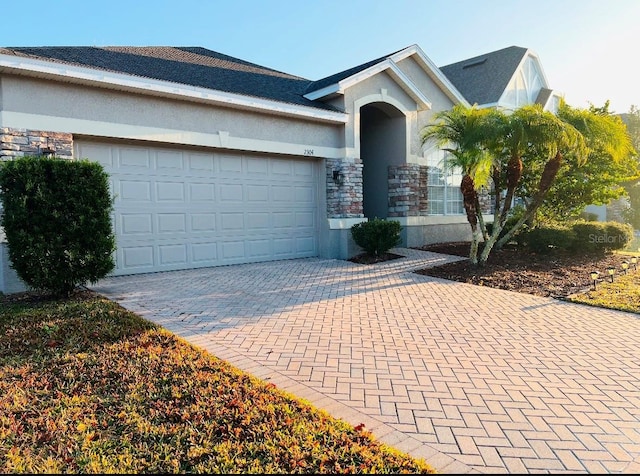 view of front of property with a garage