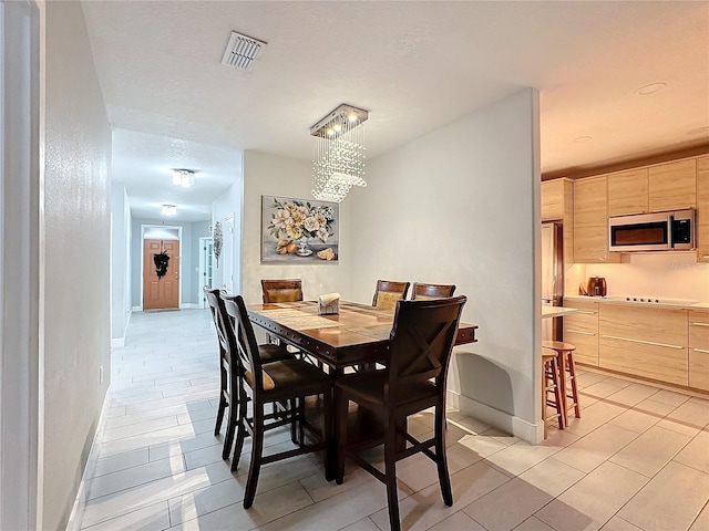 view of tiled dining space