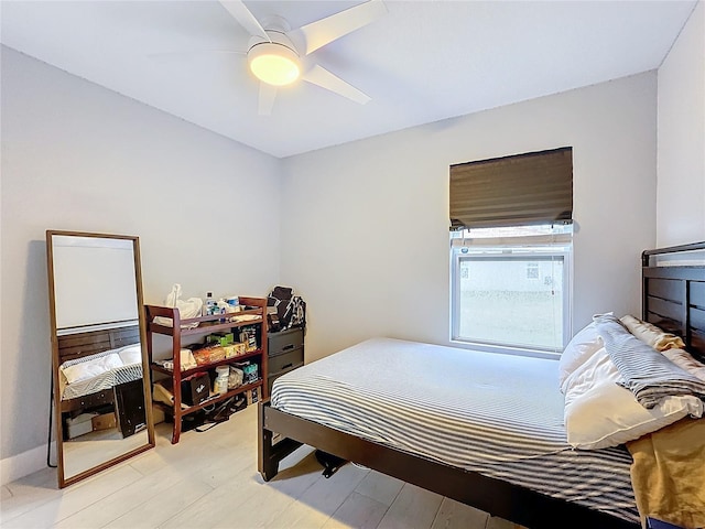 bedroom featuring ceiling fan and light wood-type flooring