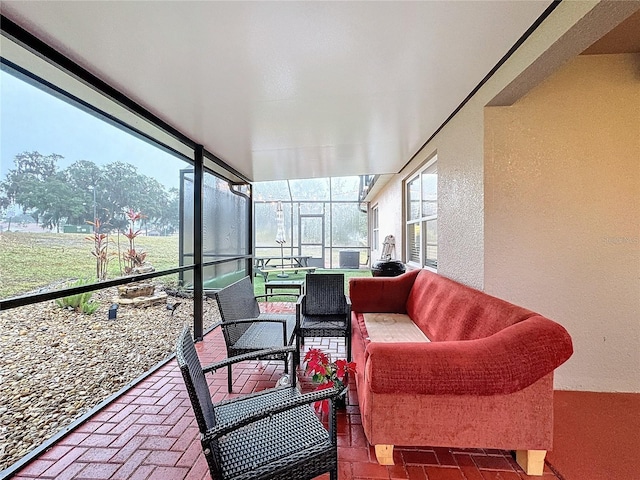 sunroom / solarium featuring a wealth of natural light