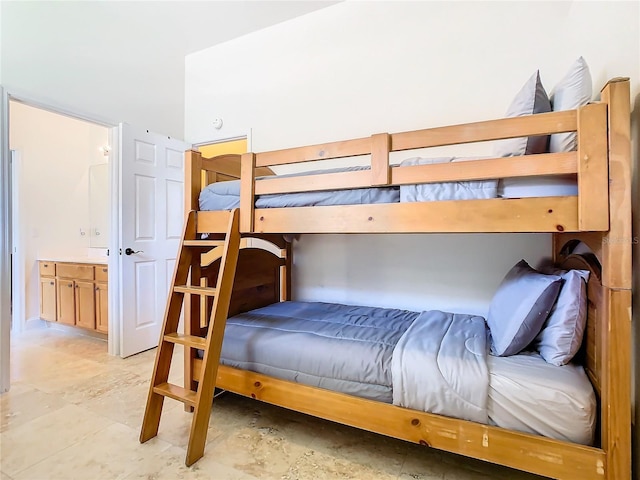 bedroom featuring connected bathroom