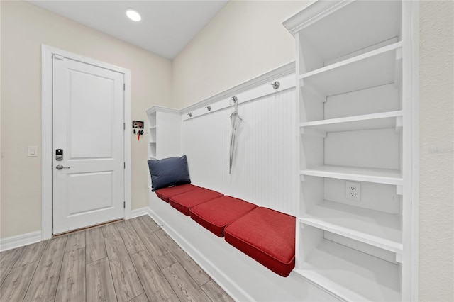 mudroom with light hardwood / wood-style flooring