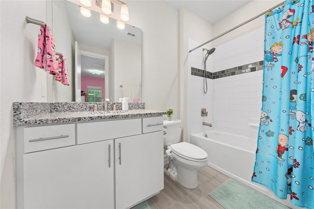 full bathroom featuring vanity, toilet, shower / bathtub combination with curtain, and wood-type flooring