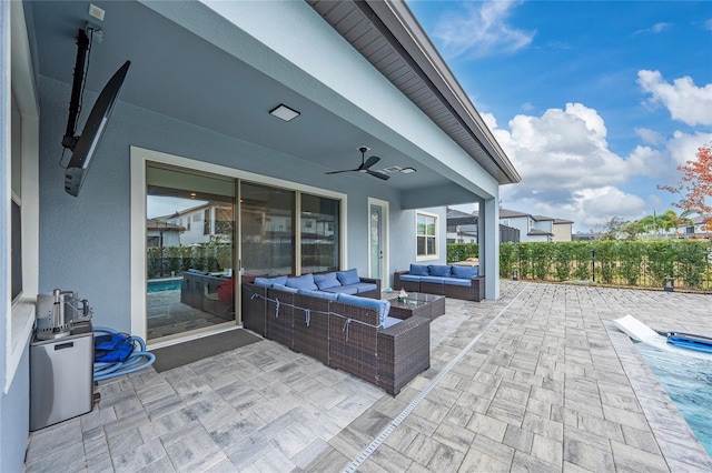 view of patio featuring an outdoor hangout area and ceiling fan