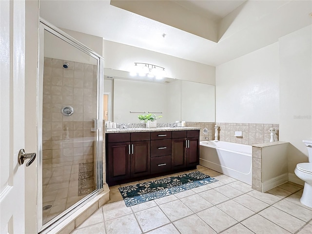 full bathroom with tile patterned flooring, vanity, plus walk in shower, and toilet