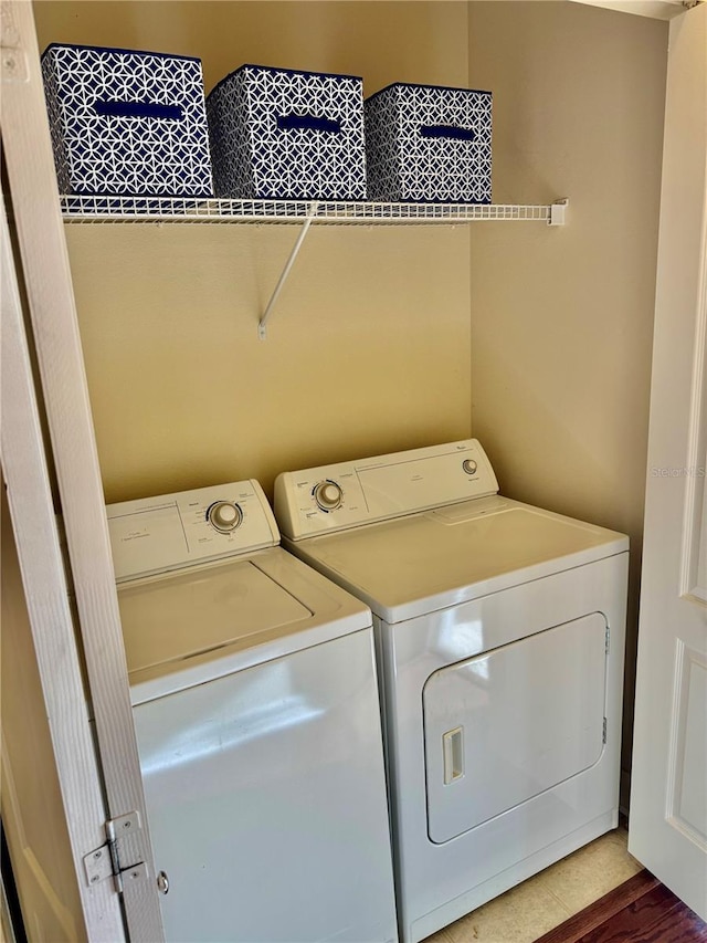 laundry area featuring washer and clothes dryer