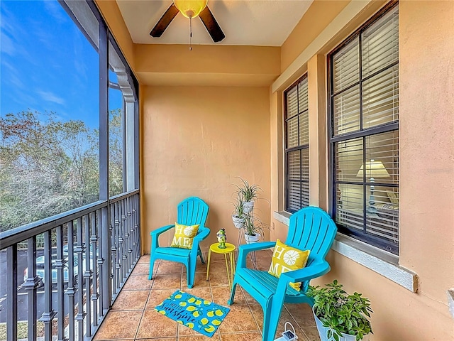 sunroom / solarium with ceiling fan